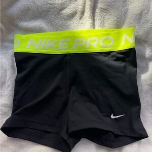 Nike Black Compression Shorts with Neon Yellow Waistband